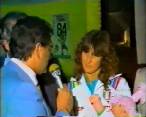 Winning captain Betty Vignotto with sinister Bride of Chucky-style mascot 'Paulina' 