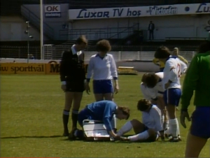 Linda Curl attended to by physio Tony Brightwell