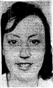 A greyscale portrait picture of a dark haired young woman